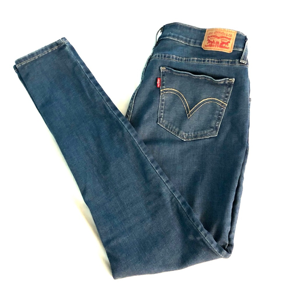 Levi’s 535 Super Skinny jeans medium wash size 32